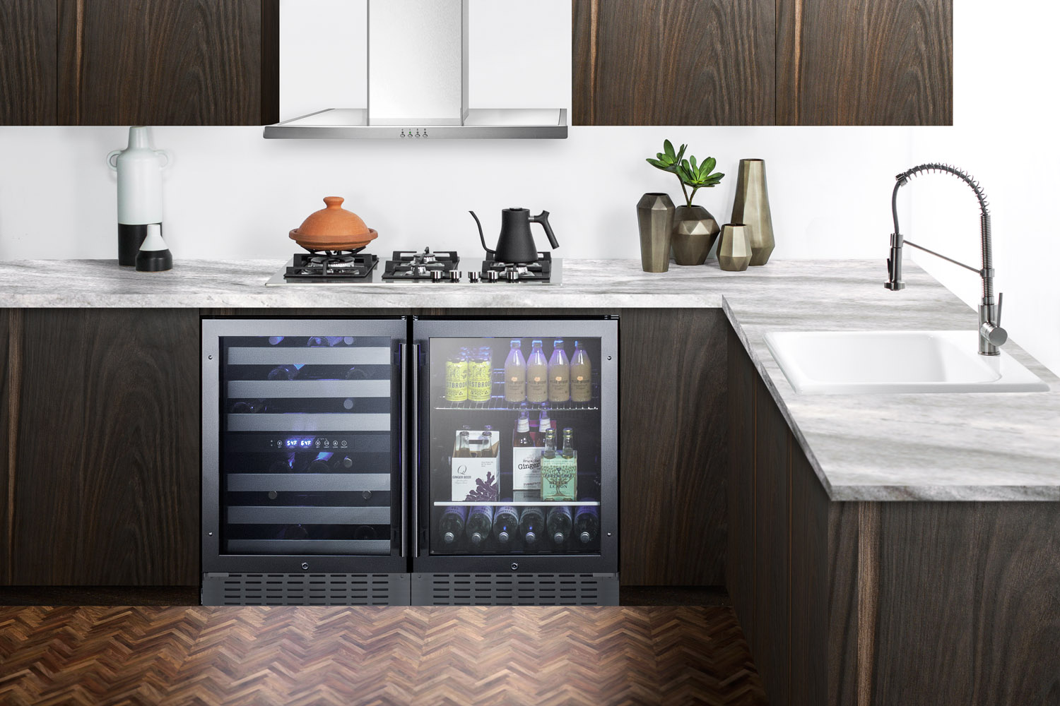 Commercially approved dual zone built-in wine cellar with digital thermostat, seamless stainless steel trimmed glass door, and stainless steel wrapped cabinet